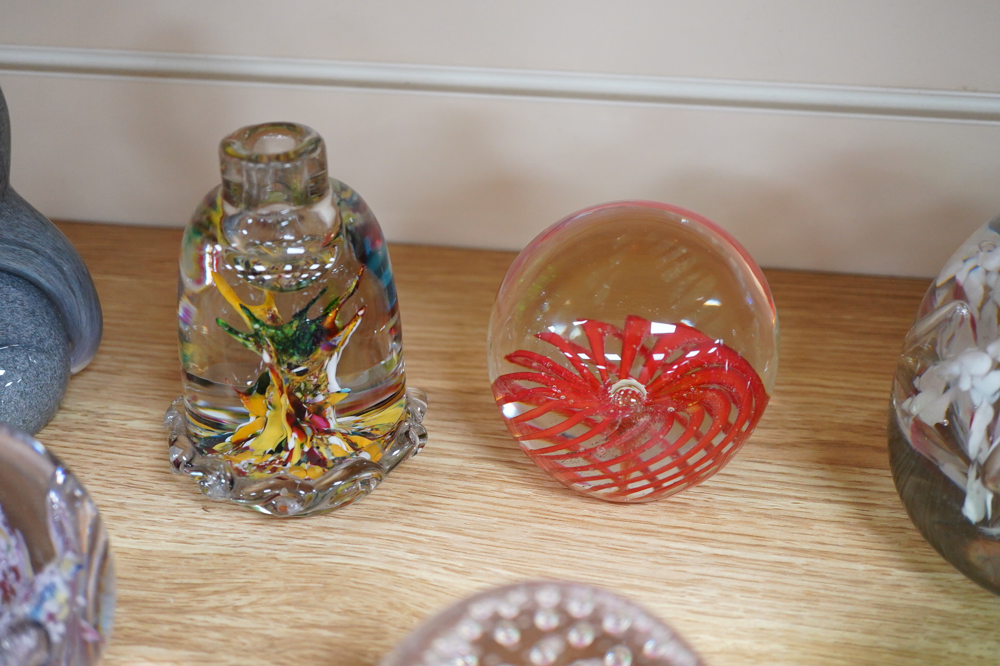 A large collection of 20th century paperweights to include Svaja, Mdina and some novelty examples in the form of animals, largest 27cm high